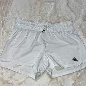 white adidas athletic shorts